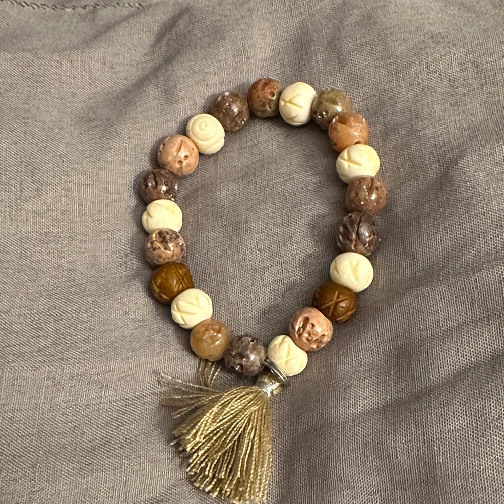 Elegant Beaded Bracelet with Tassel